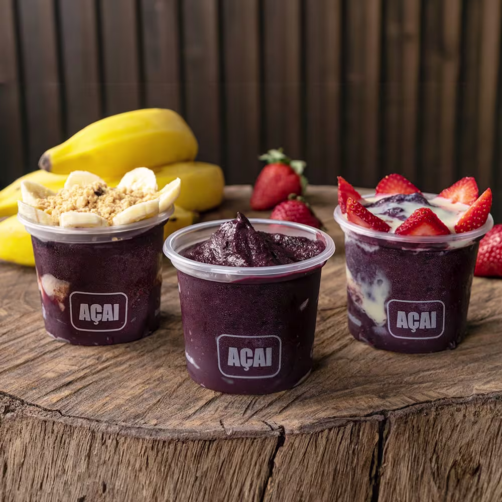 Premium açaí with fresh fruits, granola, and honey toppings - showcasing our signature product quality